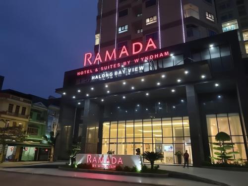 a building with a sign that reads raniadi at night at Sun View Homestay in Ha Long