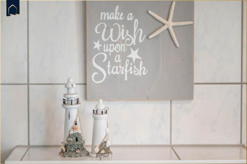 a sign that says make a wish upon a starbucksemetery at Förster-Schrödter-Str 10-14 Strandbrise in Ostseebad Koserow