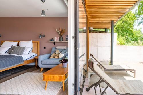 En eller flere senge i et værelse på Gamekeepers Lodge