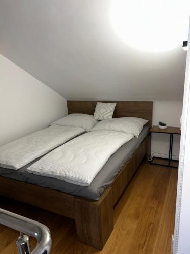 a bed in a small room with at Apartment 98A7 in Povljana