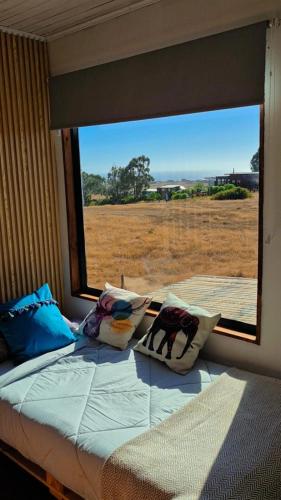 Una cama o camas en una habitación de Alto Catrianca