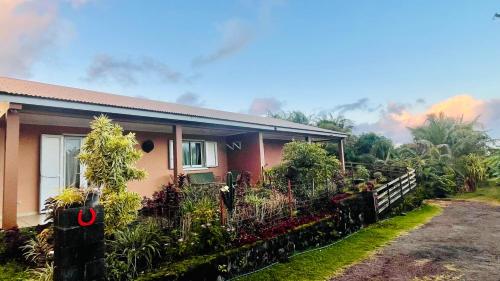 a house with a fence in front of it at Soleil Levant by Tropic Locations in Sainte-Rose