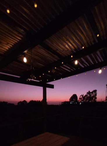 Amanecer o atardecer desde la casa vacacional o alrededores