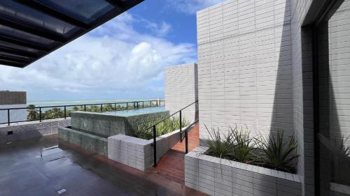 a view of the ocean from a building at Apartment in Praia de Formosa in Cabedelo
