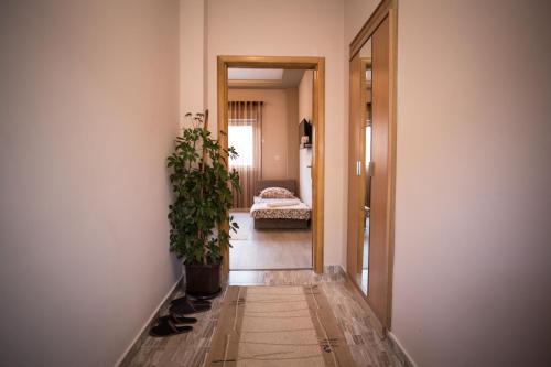 Ένα ή περισσότερα κρεβάτια σε δωμάτιο στο Apartments Ratkovic