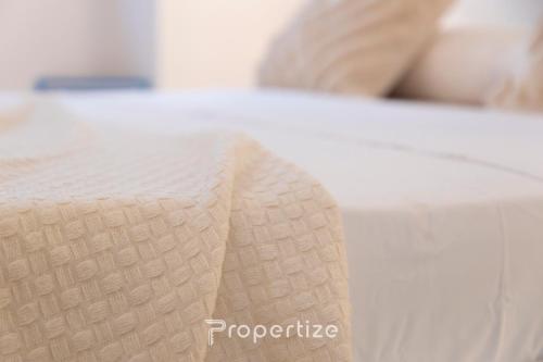 Postel nebo postele na pokoji v ubytování Lumìa - by Propertize