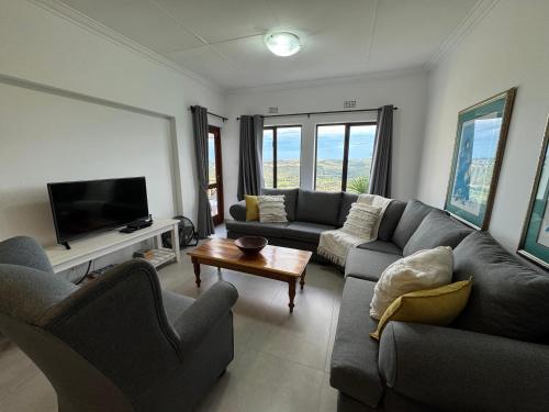 Μια τηλεόραση ή/και κέντρο ψυχαγωγίας στο Bayview Bliss Castleton 19B - Plettenberg Bay