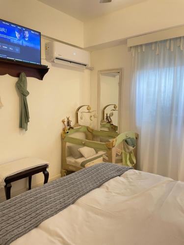 Katil atau katil-katil dalam bilik di Suite BA38 Departamento de Estilo en Microcentro
