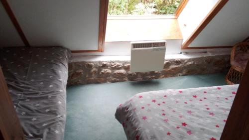 Un ou plusieurs lits dans un hébergement de l'établissement au petit bonheur