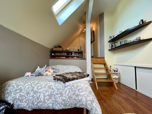Postel nebo postele na pokoji v ubytování Clos Suzette - Gîte de groupe - Maison de vacances - Kirrwiller