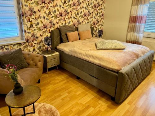 Katil atau katil-katil dalam bilik di Ferienwohnung Schwegenheim "Marion's Schmuckkästchen"