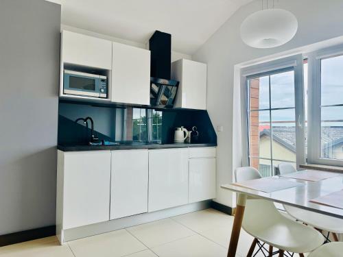 Photo de la galerie de l'établissement Haller House Apartamenty, à Władysławowo