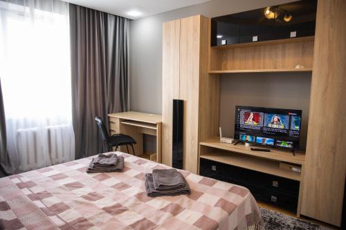 Llit o llits en una habitació de Comod apartment center