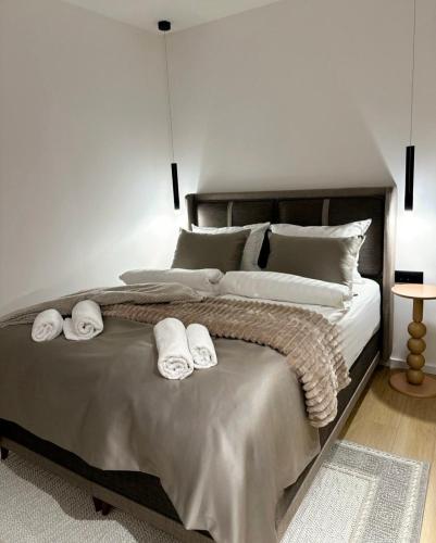 Ένα ή περισσότερα κρεβάτια σε δωμάτιο στο Four Elements Apartments