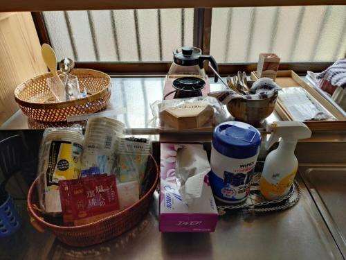 a counter top with a bunch of food on it at itoshima 個性的な日本家屋 in Itoshima