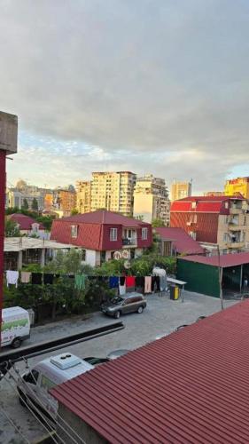 a view of a city with cars and buildings at Batumi Bliss Panoramic Views in Batumi