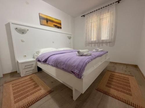 Postel nebo postele na pokoji v ubytování Villa Rajna