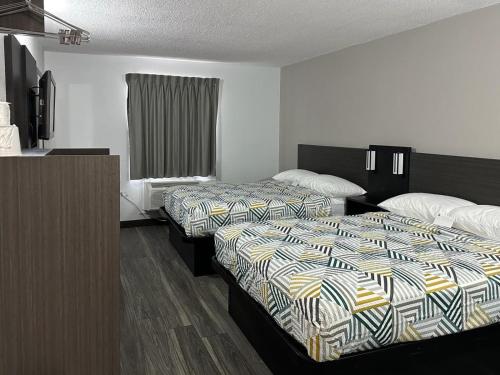 Ένα ή περισσότερα κρεβάτια σε δωμάτιο στο Motel 6-Omaha, NE