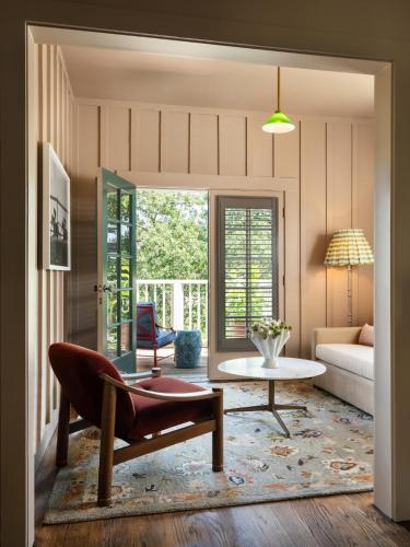 a living room with a couch and a table at Le Petit Pali St Helena in St. Helena