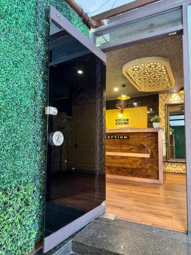 Certificado, premio, señal o documento que está expuesto en KORAMANGALA Suites