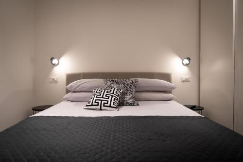 Katil atau katil-katil dalam bilik di Suite 70 Luxury Collection