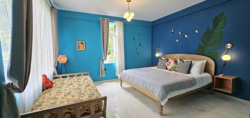 Кровать или кровати в номере Casa Li Tayrona