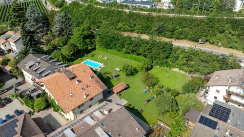 an aerial view of a house with a yard at New Residence Schnatzhof Schlanders in Silandro