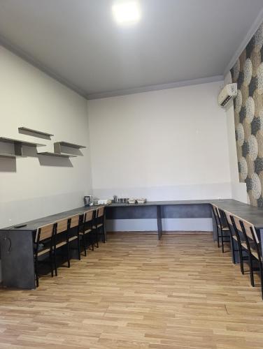 Zona business o sala de conferencias en Dreamer's Den Hostel and Tours