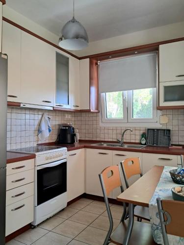 Gallery image of Menexe Apartments-Kelyfos in Neos Marmaras