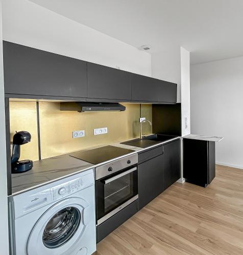 Una cocina o cocineta en Appartement moderne - Terrasse - Vue Mer - Parking - Wifi