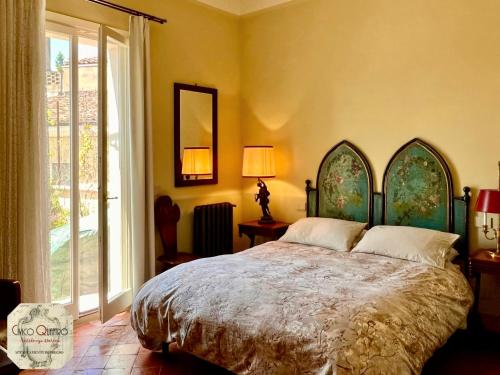 Ένα ή περισσότερα κρεβάτια σε δωμάτιο στο Civico Quattro