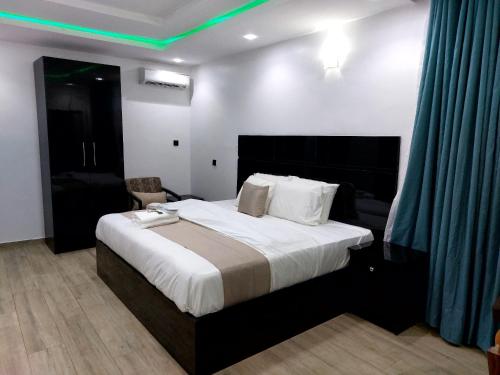 Ένα ή περισσότερα κρεβάτια σε δωμάτιο στο Celjoe Residence Hotel