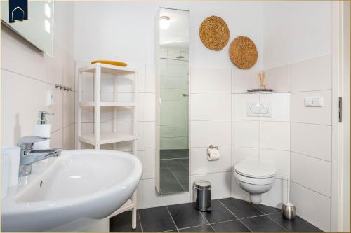 Ένα μπάνιο στο Ferienwohnung Krebssee Idyll 1