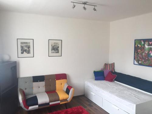 Ένα ή περισσότερα κρεβάτια σε δωμάτιο στο Studio Ostrava - Masarykovo náměstí