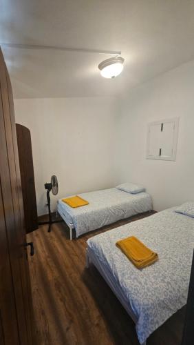 Postel nebo postele na pokoji v ubytování PALAZZO Sintra GH