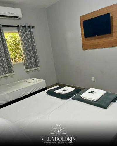 Katil atau katil-katil dalam bilik di Villa Boldrin Hotel e Eventos By Easy Hotéis