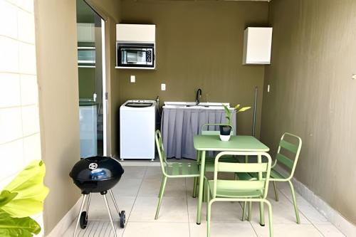 Kuchyň nebo kuchyňský kout v ubytování Linda cobertura com vista