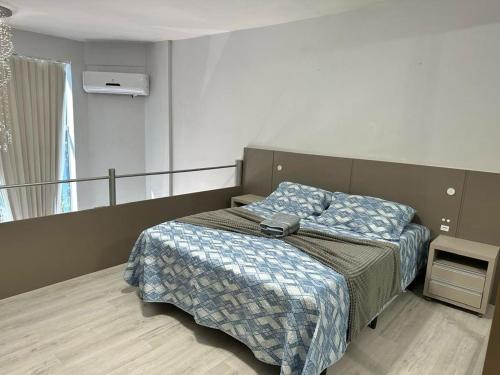 Ένα ή περισσότερα κρεβάτια σε δωμάτιο στο Saint Sebastian Flat 615 - Com Hidro! até 4 pessoas, Duplex, no centro