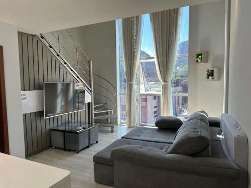 Χώρος καθιστικού στο Saint Sebastian Flat 615 - Com Hidro! até 4 pessoas, Duplex, no centro