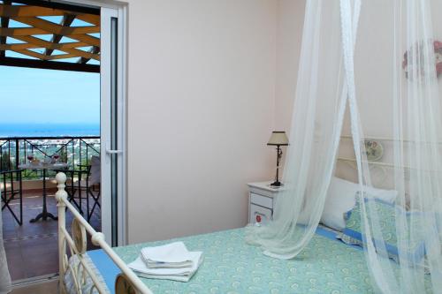 Posteľ alebo postele v izbe v ubytovaní Orizzonte Apartments Lefkada