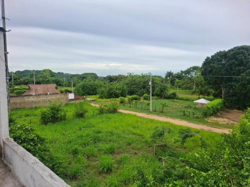 a view of a field from a building at Finca Villa Gabriela 