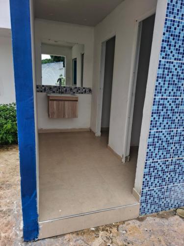 a view of a room with a mirror and a sink at Finca Villa Gabriela 