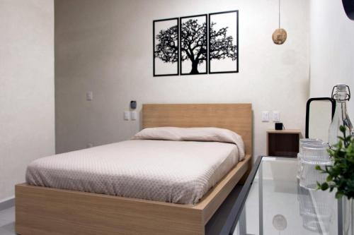 Ένα ή περισσότερα κρεβάτια σε δωμάτιο στο Casa Sta Inés