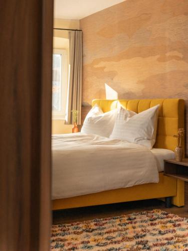 Postel nebo postele na pokoji v ubytování Hotel Gut Sein