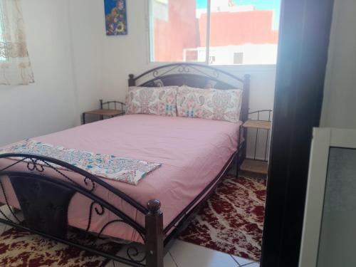Una cama o camas en una habitación de complexe MIXTA SAFIA BLOCK 7 ETG 2 APRT 40 MARTIL