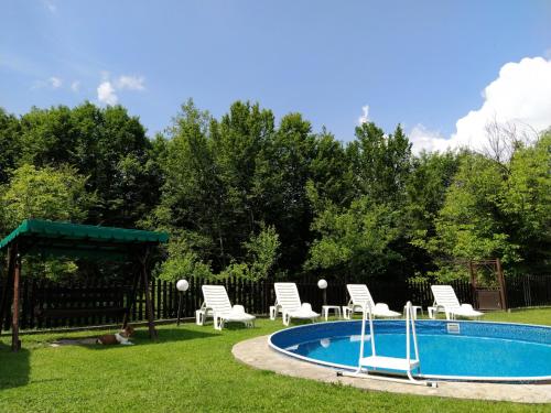 Swimmingpoolen hos eller tæt på Къщи за гости Костови