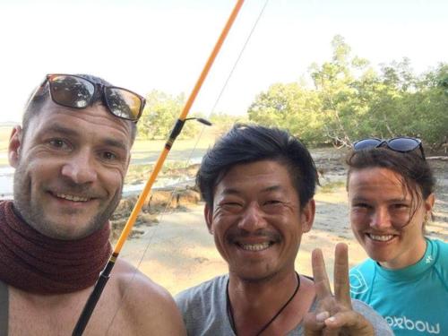 three men posing for a picture with their thumbs up at Cashew Nut Bungalow, Ko Mook in Koh Mook