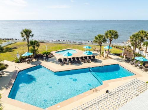 an overhead view of a swimming pool and the ocean at 327 Capt John Fripp Villa in Fripp Island