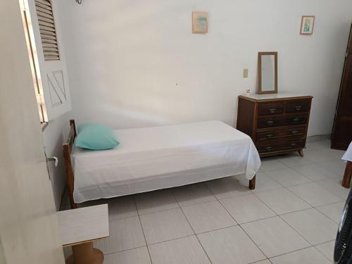 Postel nebo postele na pokoji v ubytování Recanto do Cajueiro, Sua casa de praia