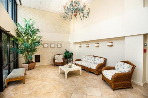 a lobby with couches and a table in a building at Virginia one #515 in Rehoboth Beach
